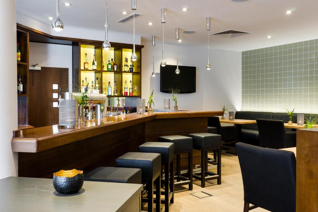 Lounge nebo bar v ubytování Upstalsboom Parkhotel