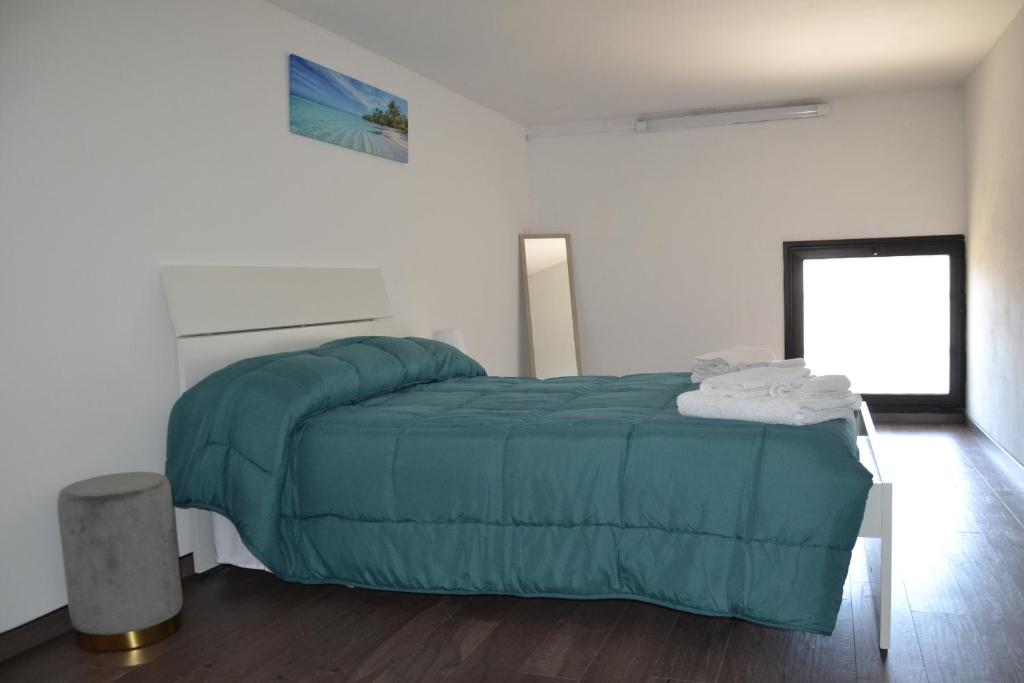 Postel nebo postele na pokoji v ubytování ENDLESS SUMMER APARTMENTS