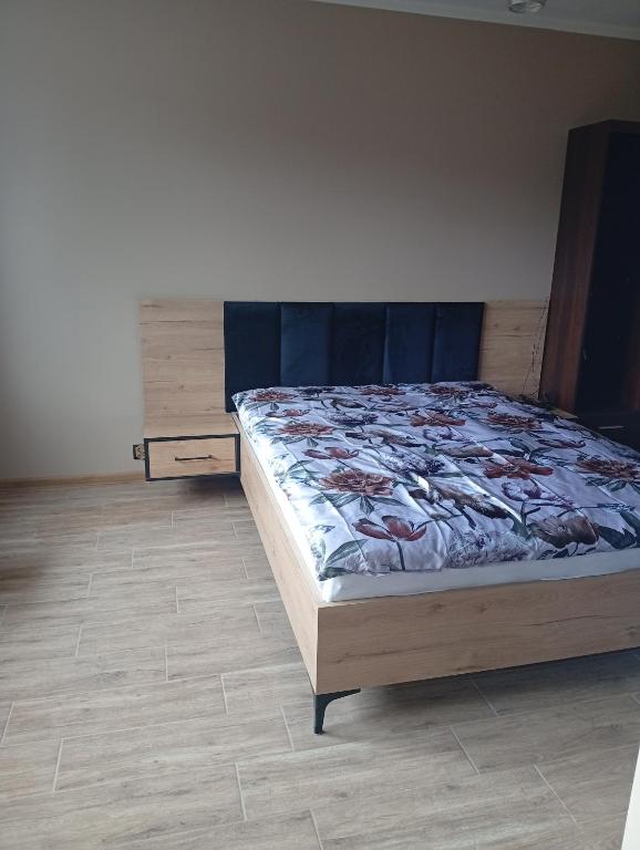 Postel nebo postele na pokoji v ubytování Boguszów