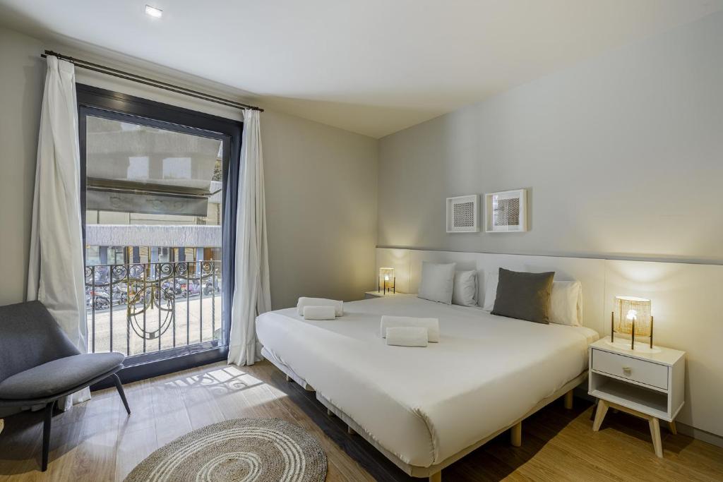 Posteľ alebo postele v izbe v ubytovaní Ola Living Hostal Diagonal