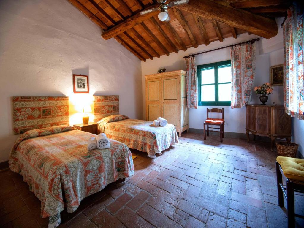 Posteľ alebo postele v izbe v ubytovaní Apartment with large garden and pool on the hills of Pisa