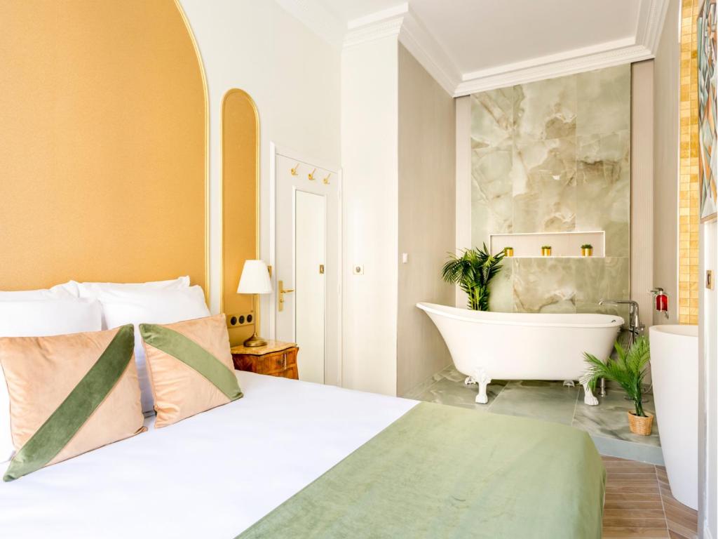 Posteľ alebo postele v izbe v ubytovaní Merveil - Luxury Suite - Louvre - Marcel III