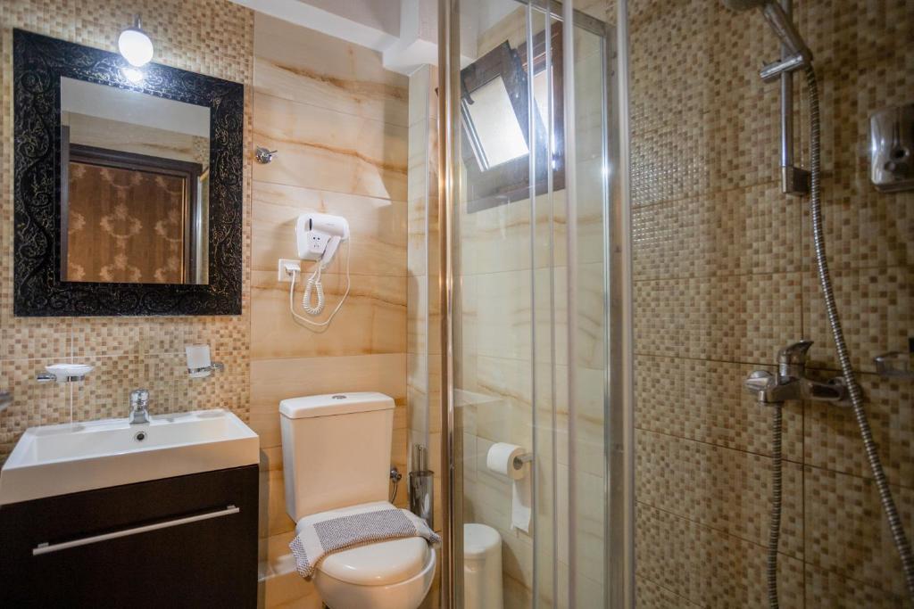 Łazienka w obiekcie Toti Boutique Rooms
