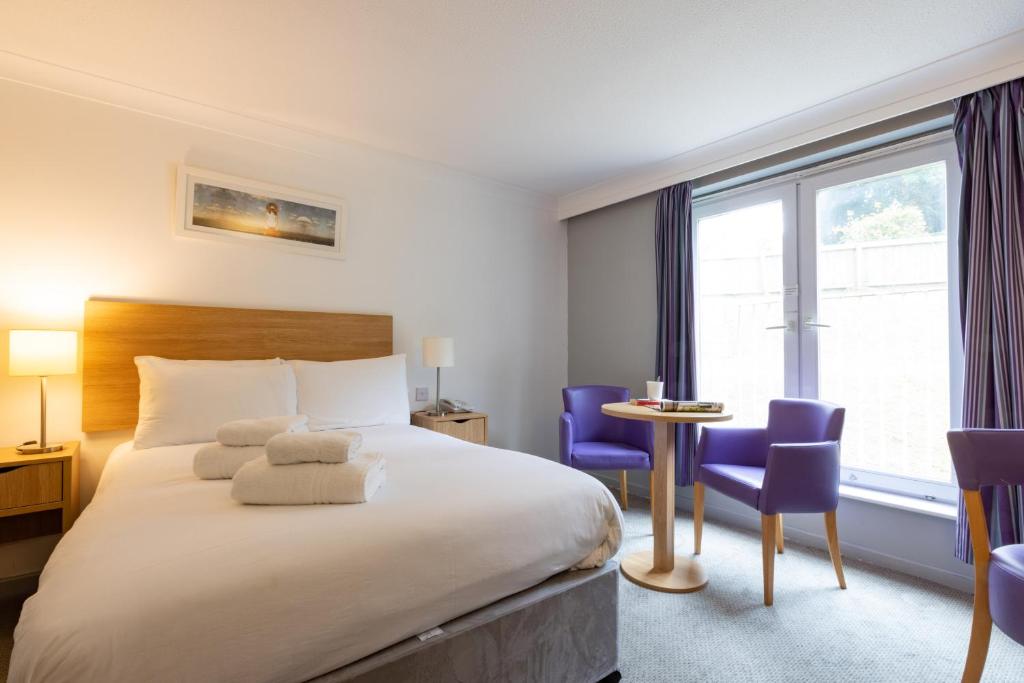 The Broadway Park Hotelにあるベッド
