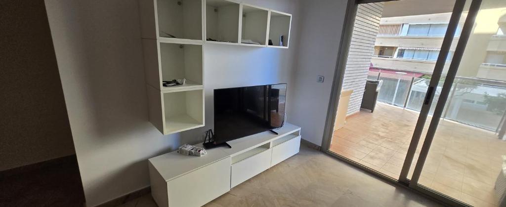 TV a/nebo společenská místnost v ubytování Sol en la plaja
