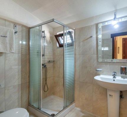 Łazienka w obiekcie Toti Boutique Rooms