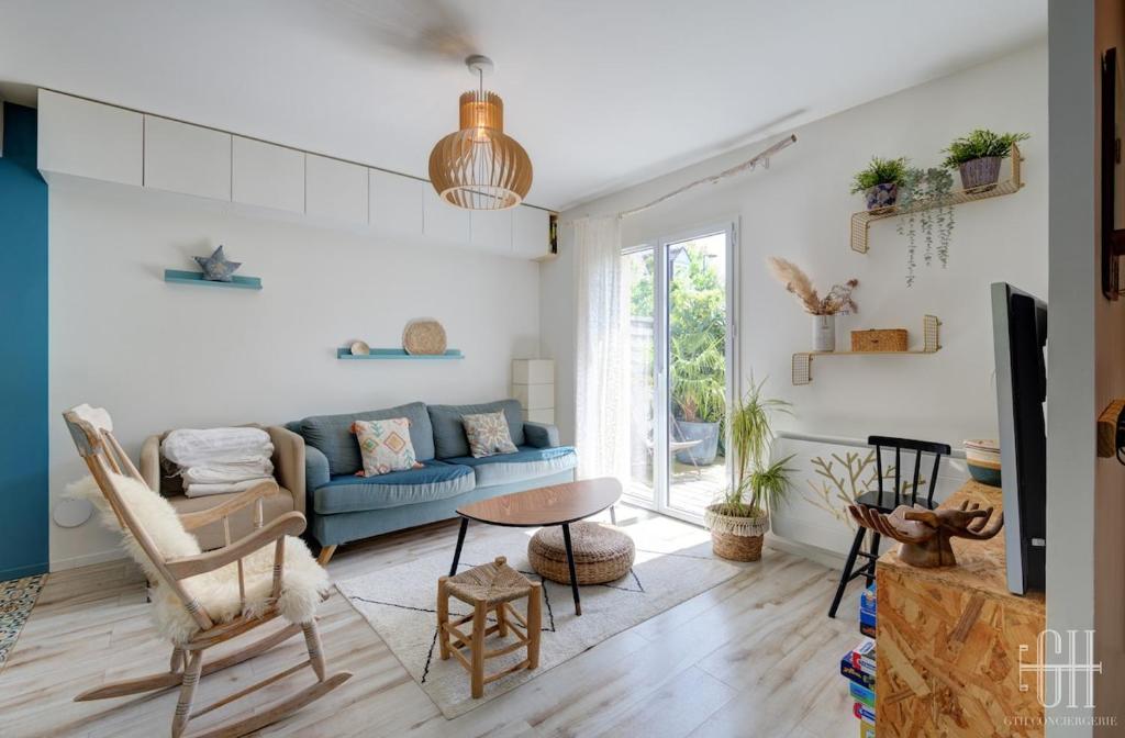 Posezení v ubytování L'Érudit - Maison avec jardin - 9 V - Parking