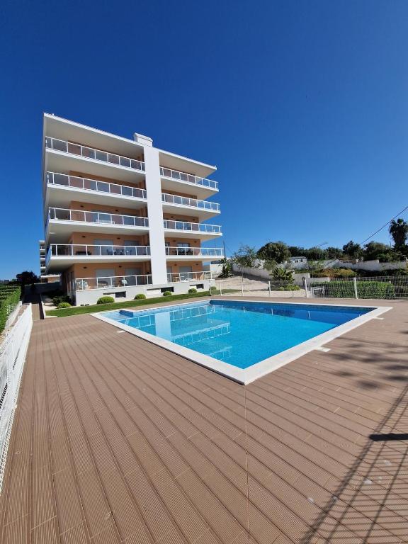 Modern apartment with pool and close to the beach