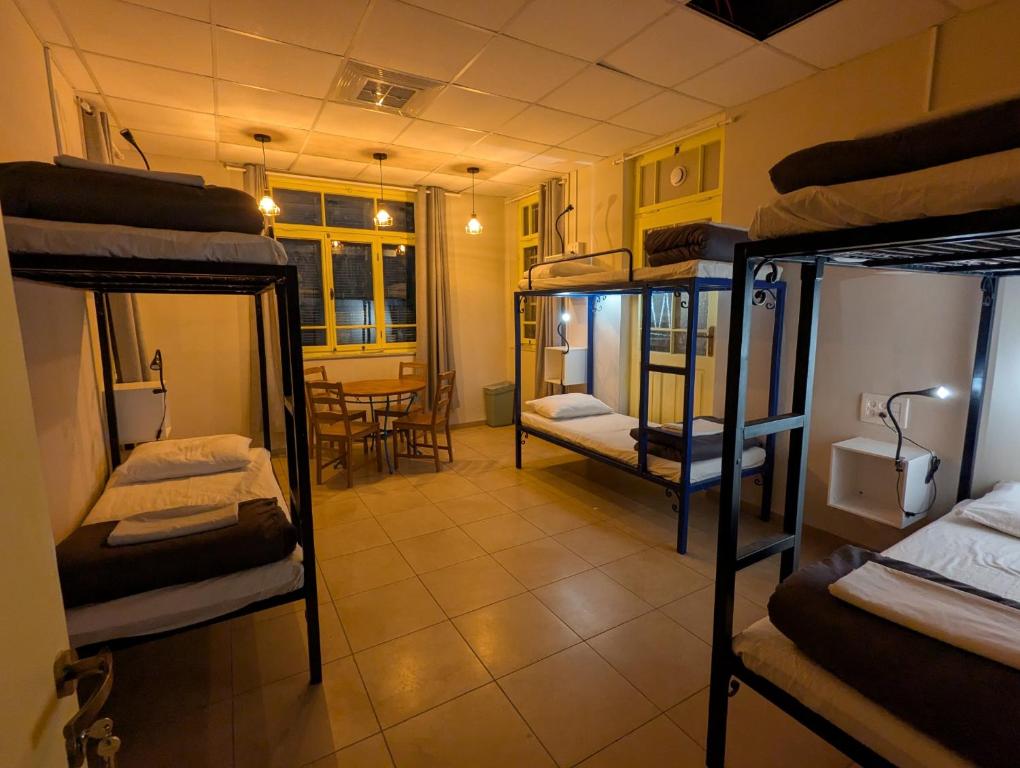 Postel nebo postele na pokoji v ubytování Nest House