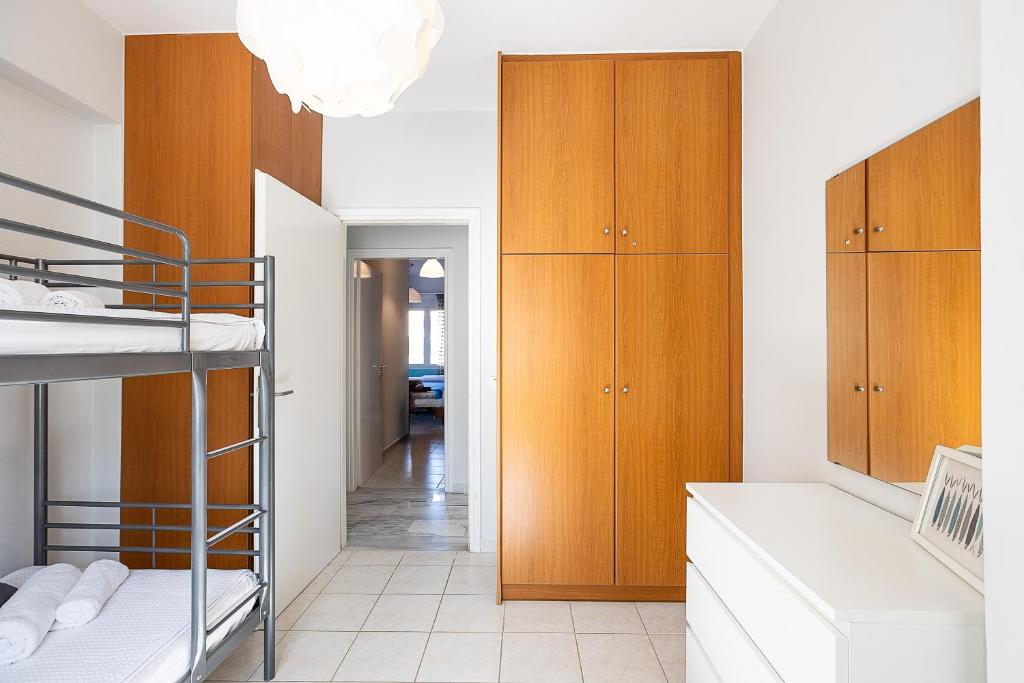Posteľ alebo postele v izbe v ubytovaní Pigi Paradise Residence