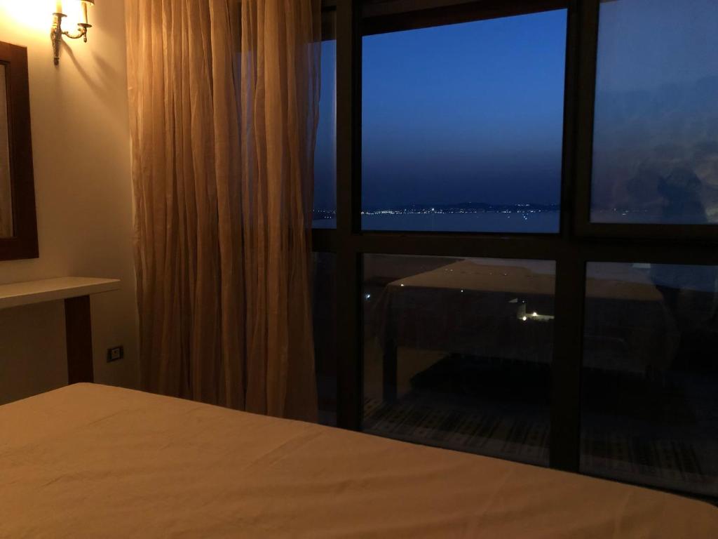 Postel nebo postele na pokoji v ubytování BiZa Coast, Ma Vie Là