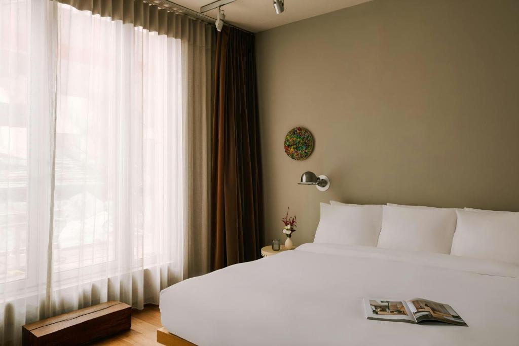 Postel nebo postele na pokoji v ubytování Chambers Hotel Central Park South, Sonder by Marriott Bonvoy