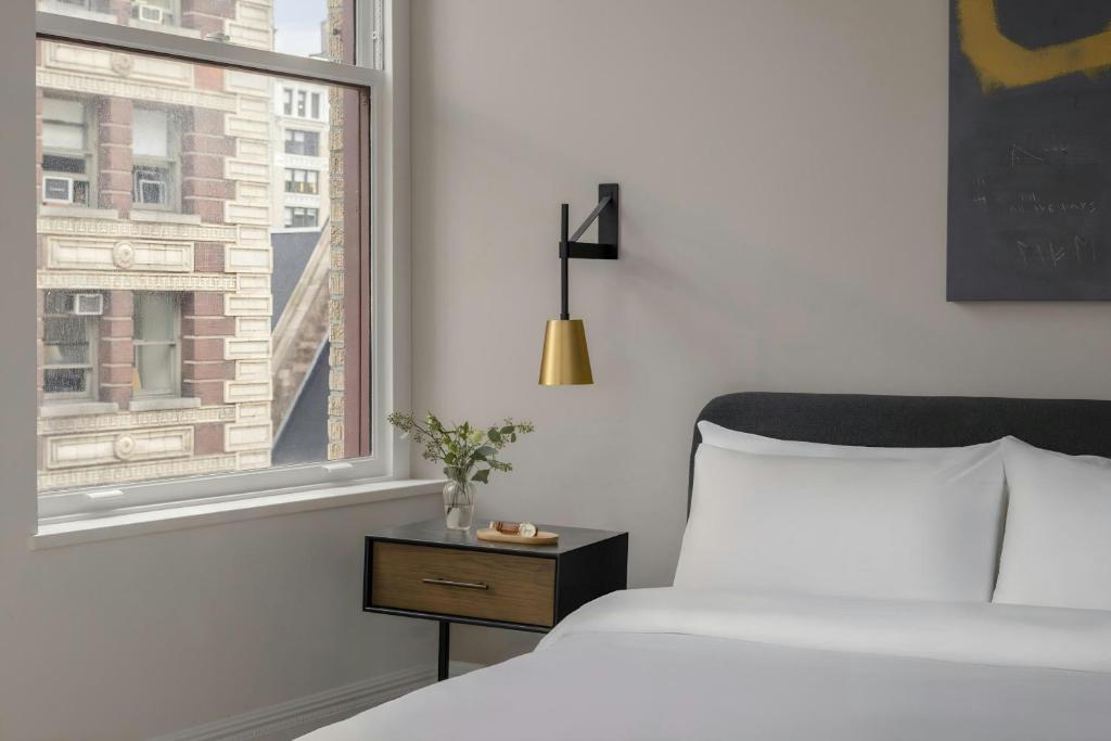 Cama ou camas em um quarto em Flatiron Hotel, Sonder by Marriott Bonvoy