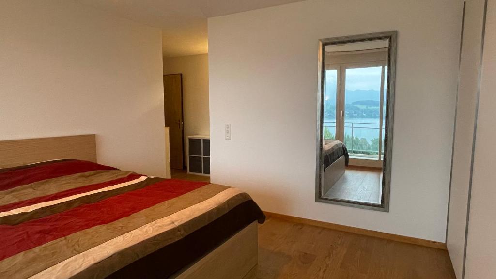 Postel nebo postele na pokoji v ubytování Lakeside Lucerne