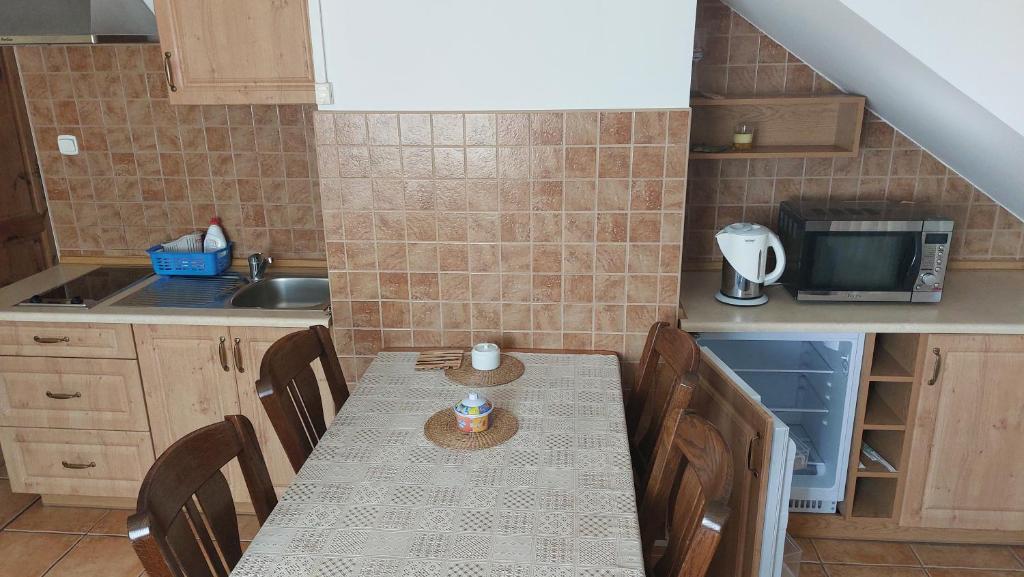 Kuchyňa alebo kuchynka v ubytovaní Apisoltysowka