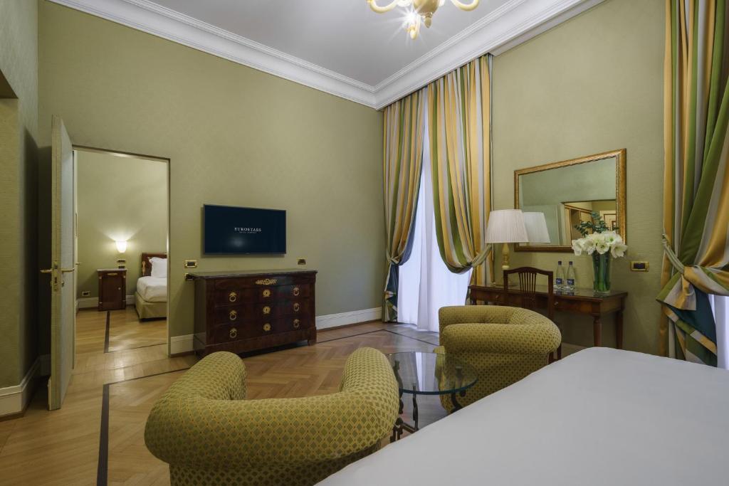 Postel nebo postele na pokoji v ubytování Eurostars Hotel Excelsior