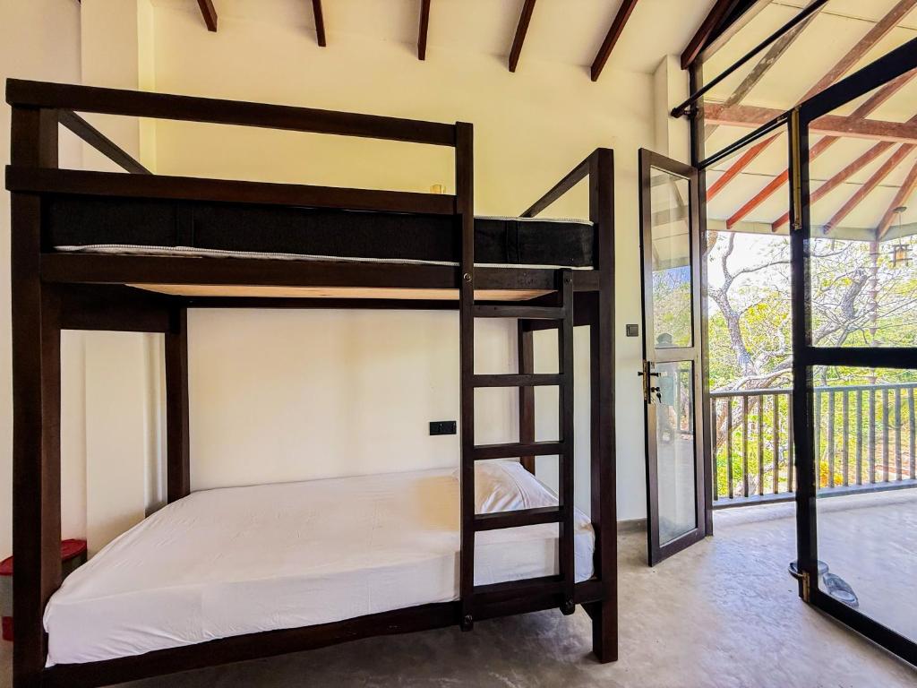 Postel nebo postele na pokoji v ubytování Go Yala Hostel