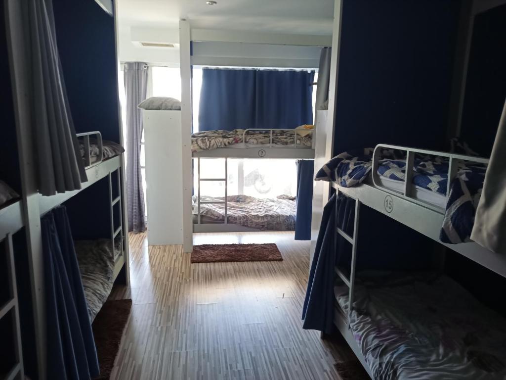 Postel nebo postele na pokoji v ubytování Hostel Renato