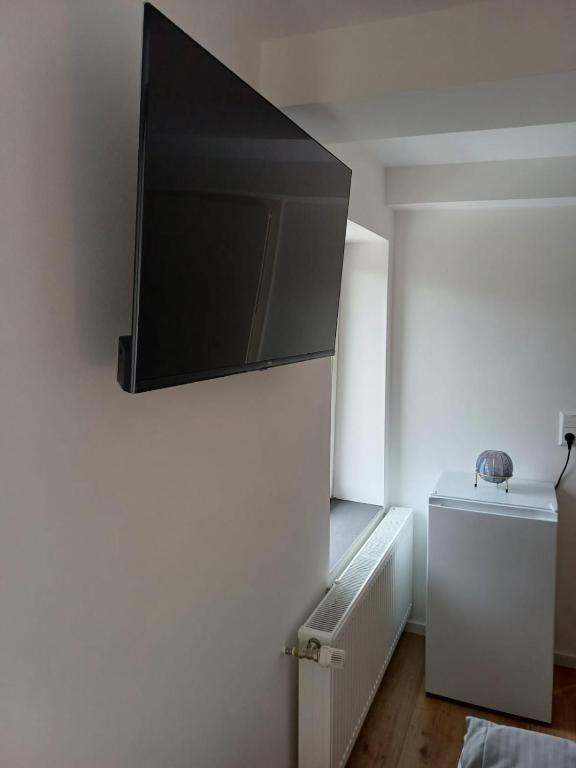 TV a/nebo společenská místnost v ubytování Motel Königslutter