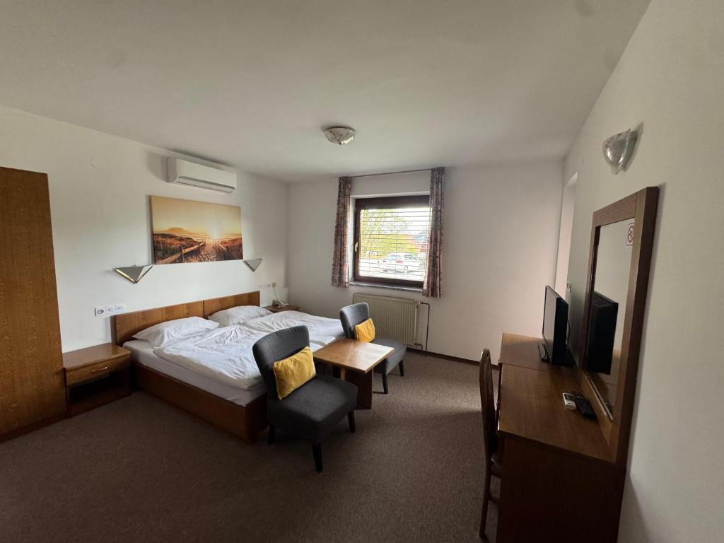 Postel nebo postele na pokoji v ubytování Guest House Bakhus