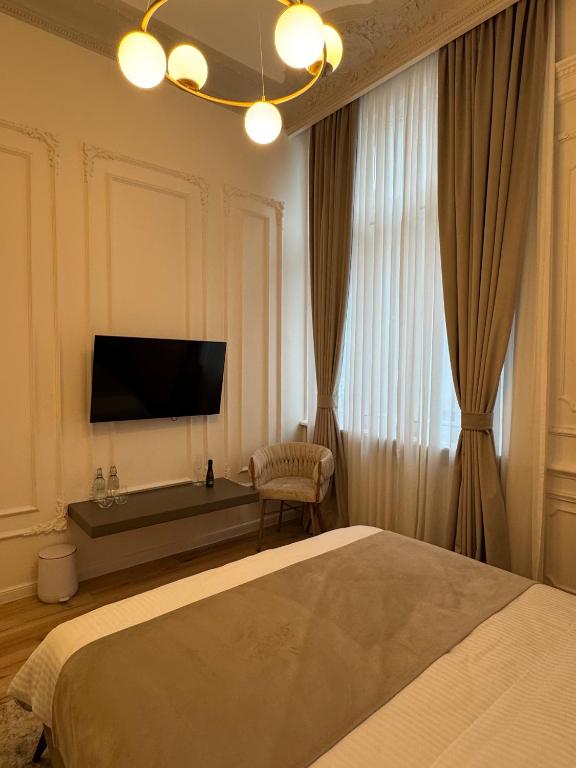 Postel nebo postele na pokoji v ubytování House4You - Praporgescu