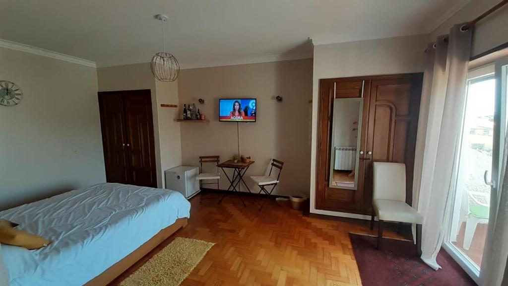 Postel nebo postele na pokoji v ubytování Morada do Ultramar