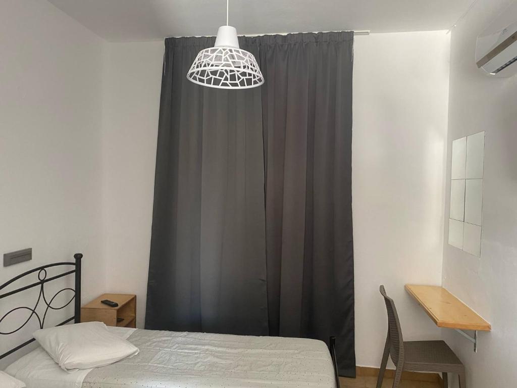 Postel nebo postele na pokoji v ubytování Mary Studios