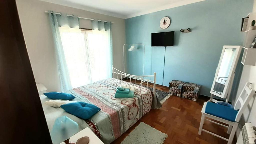 Postel nebo postele na pokoji v ubytování Morada do Ultramar