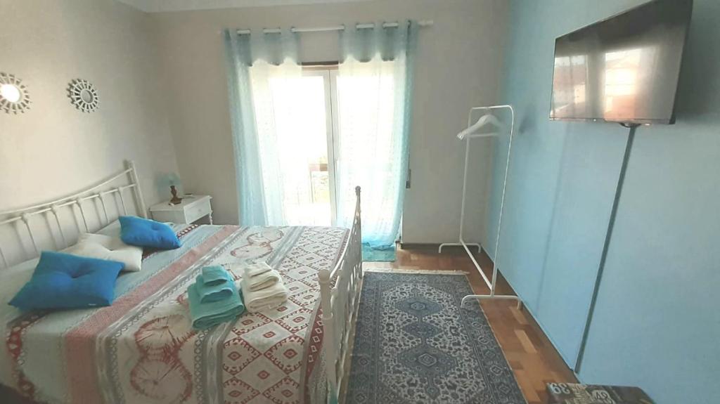 Postel nebo postele na pokoji v ubytování Morada do Ultramar
