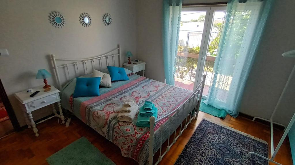 Postel nebo postele na pokoji v ubytování Morada do Ultramar