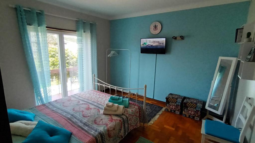 TV a/nebo společenská místnost v ubytování Morada do Ultramar