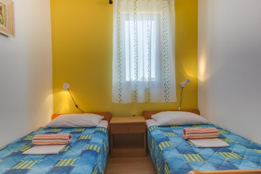 Postel nebo postele na pokoji v ubytování House Prica