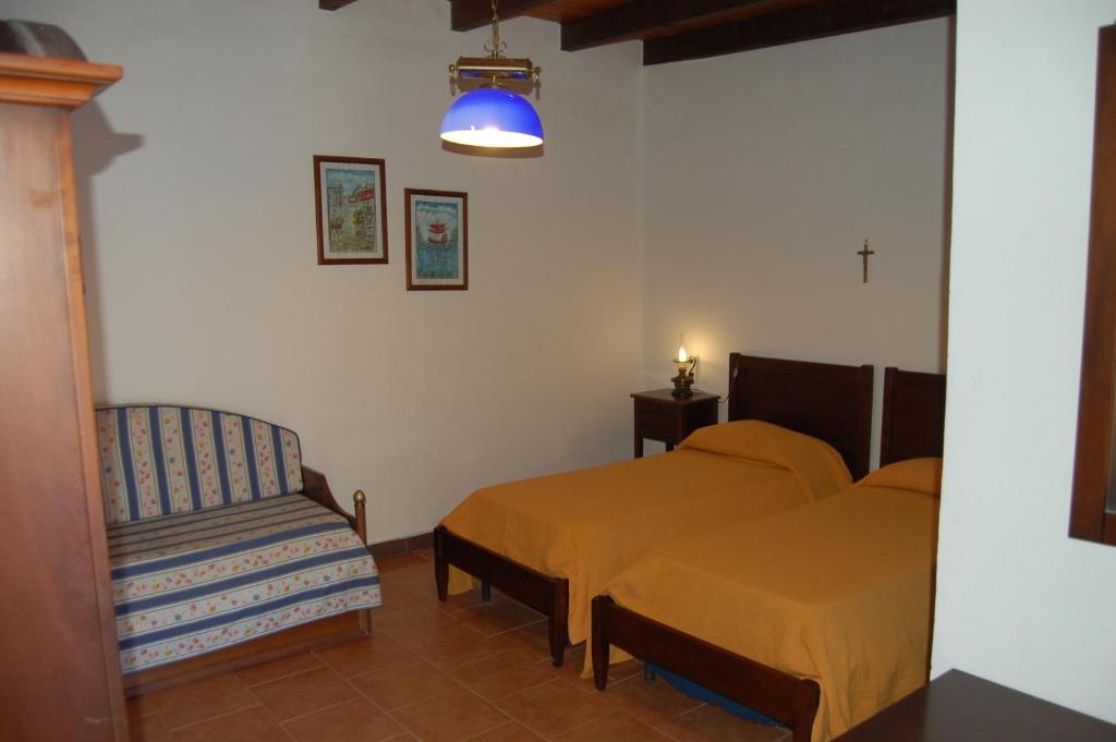 Postel nebo postele na pokoji v ubytování Hotel Al Togo Fitness & Relax