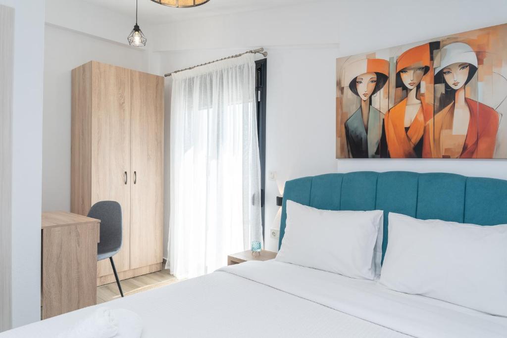Postel nebo postele na pokoji v ubytování Danai & Palm Residential Complexes