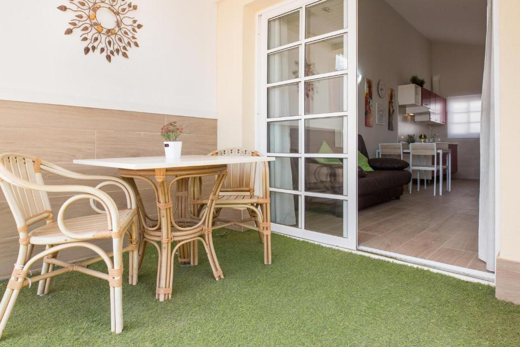 A seating area at Caleta Beach Deluxe