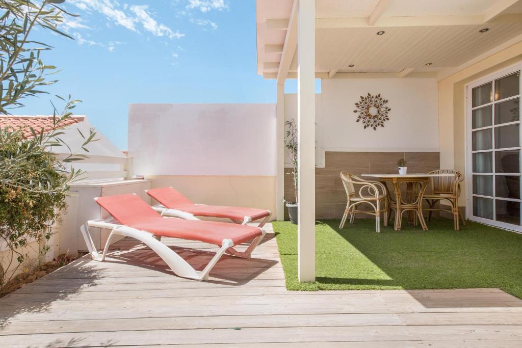 A balcony or terrace at Caleta Beach Deluxe