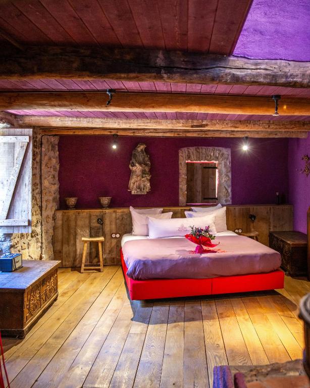 Postel nebo postele na pokoji v ubytování Village Castigno - Wine Hotel & Resort