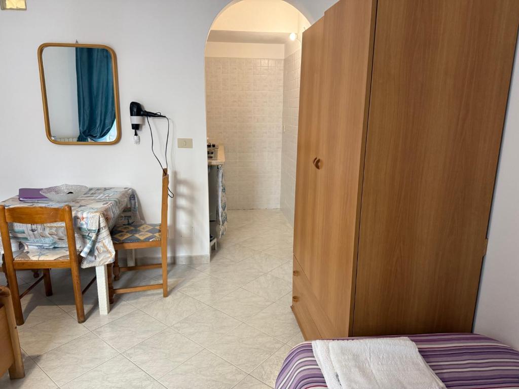 Postel nebo postele na pokoji v ubytování Ponzamania Appartamenti da Silverio