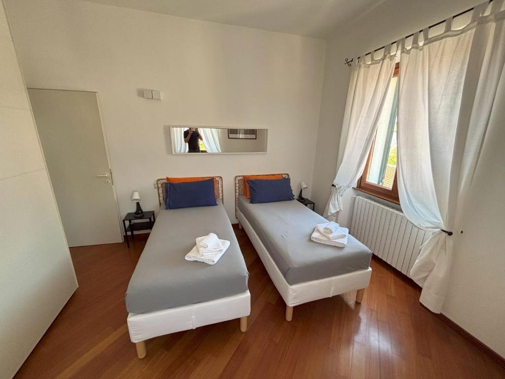 Posteľ alebo postele v izbe v ubytovaní Casa Vacanze Magnolia