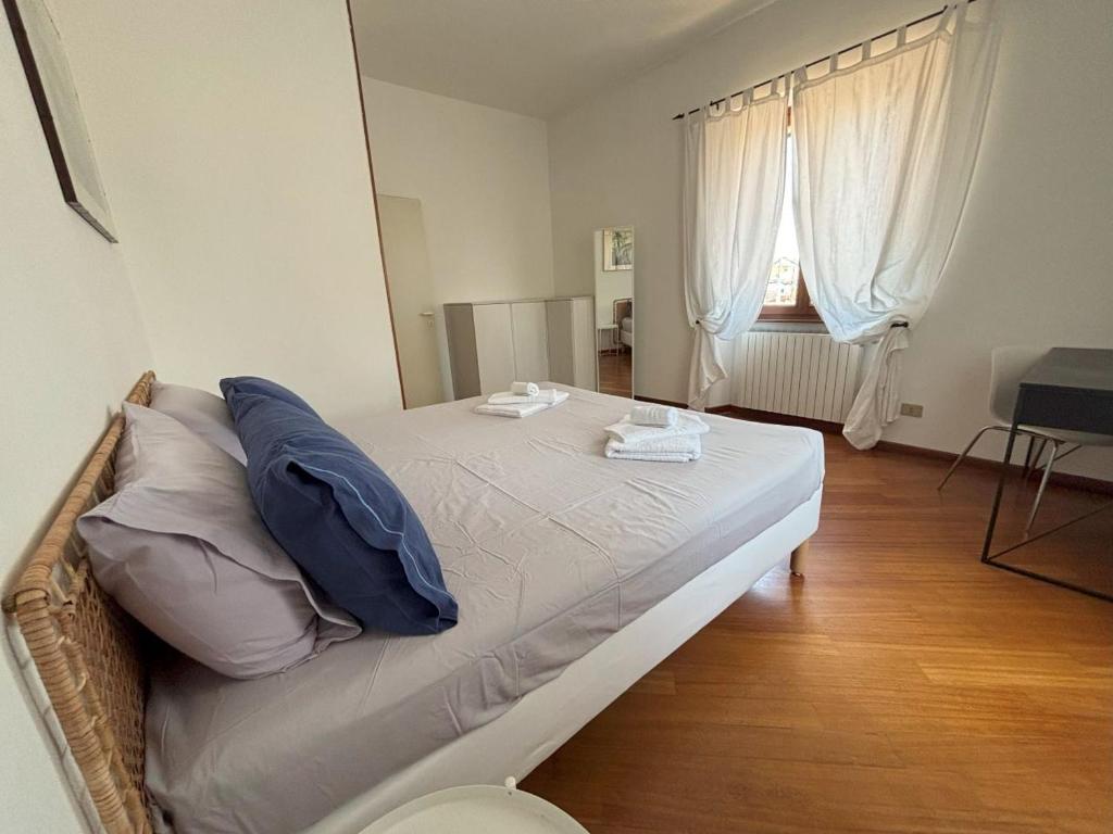 Posteľ alebo postele v izbe v ubytovaní Casa Vacanze Magnolia