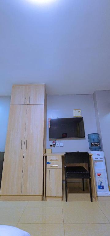 Kuchyň nebo kuchyňský kout v ubytování MORAN EMPIRE HOMEs