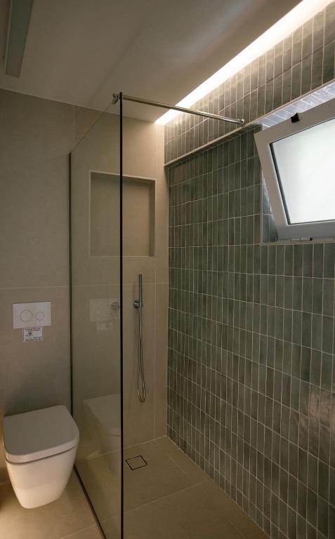 A bathroom at Myrto Homes Lefkada Agios Nikitas Greece