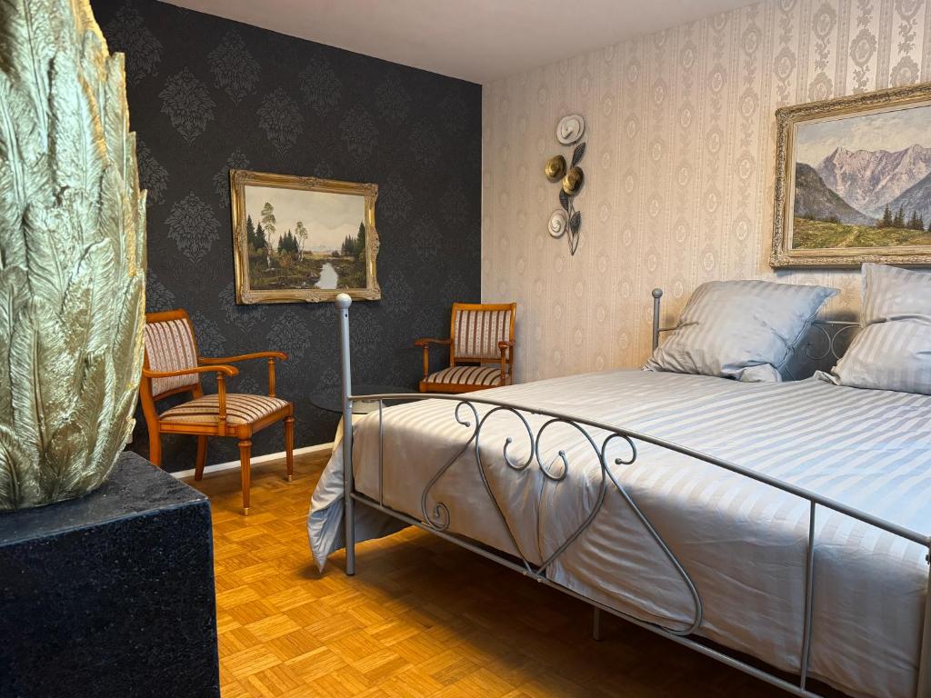 Ένα ή περισσότερα κρεβάτια σε δωμάτιο στο Salzburg Residenz