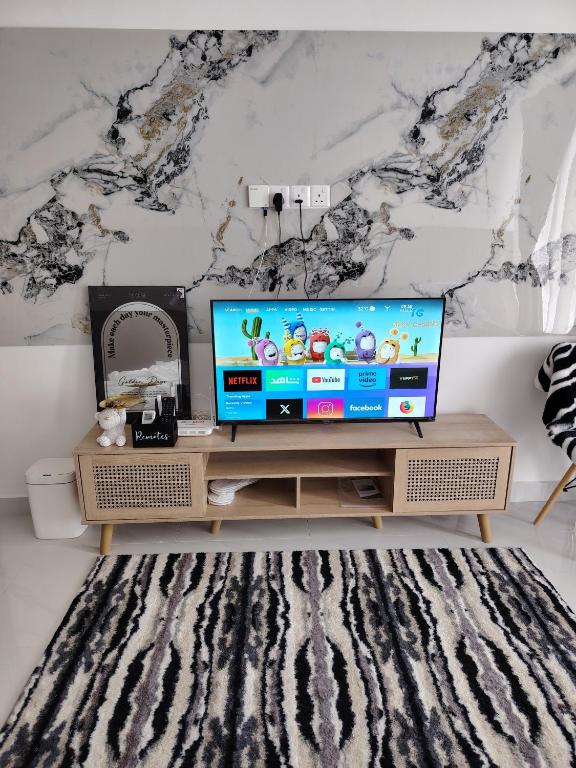 TV a/nebo společenská místnost v ubytování HyzEN StUdio, Executive Suite Room