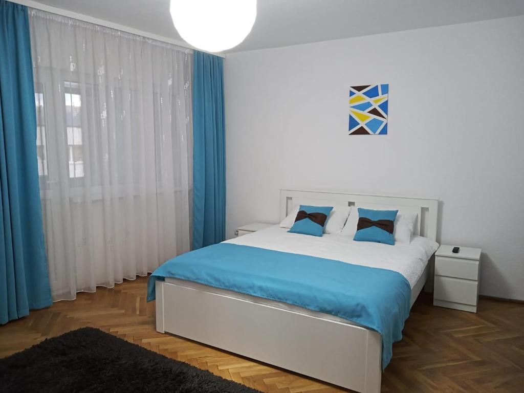 Ένα ή περισσότερα κρεβάτια σε δωμάτιο στο Apartament Azur