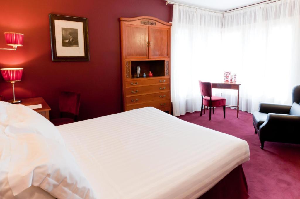 Postel nebo postele na pokoji v ubytování Antico Hotel Vicenza