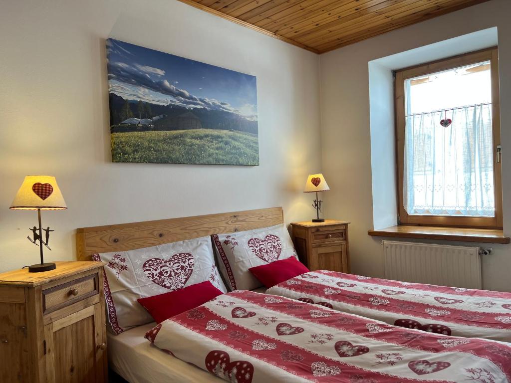 Postel nebo postele na pokoji v ubytování Appartamenti Benvenuti