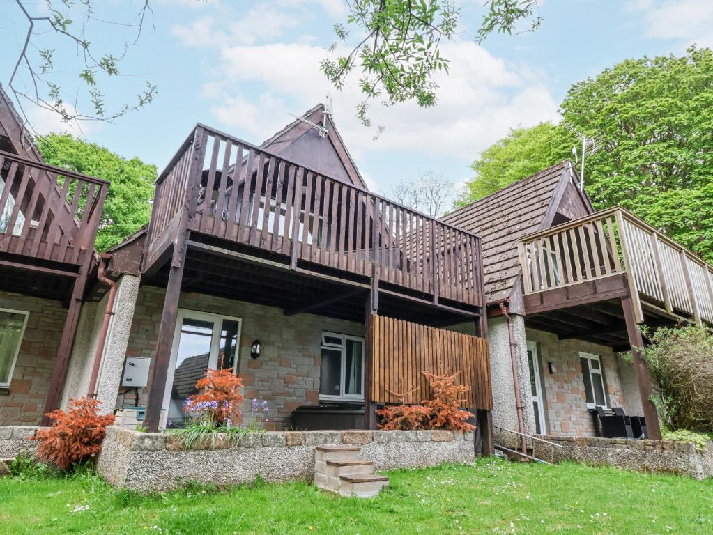 a house with two decks on top of it at 23 Valley Lodge in Callington