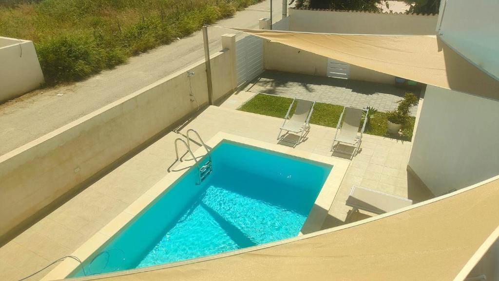 Basen w obiekcie Baia Marzamemi appartamenti Vendicari, Balata, Tonnara, Cortile del Rais lub w pobliżu
