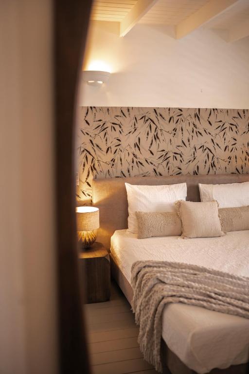 Postel nebo postele na pokoji v ubytování Botanique Bungalows Westpunt